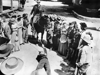 Joel McCrea (on horse), on-set of the film, "Cattle Empire", 20th Century-Fox, 1958