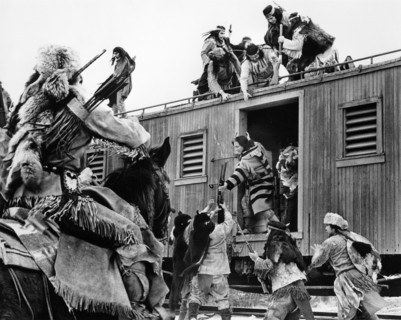 Native American bandits robbing weapons from train, on-set of the film, "Breakheart Pass", United