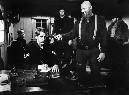 Robert Tessier (with gun), on-set of the film, "Breakheart Pass", United Artists, 1976