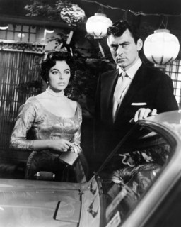 Joan Collins, Ken Scott, on-set of the film, "Stopover Tokyo", 20th Century-Fox, 1957