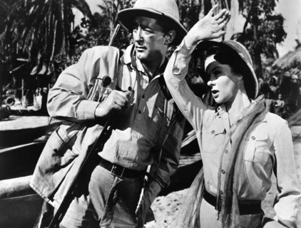 Robert Mitchum, Susan Hayward, on-set of the film, "White Witch Doctor", 20th Century-Fox, 1953