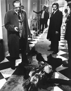 Arthur Kennedy (left with handgun), on-set of the Spanish-Italian film, "Don't Open The Window",