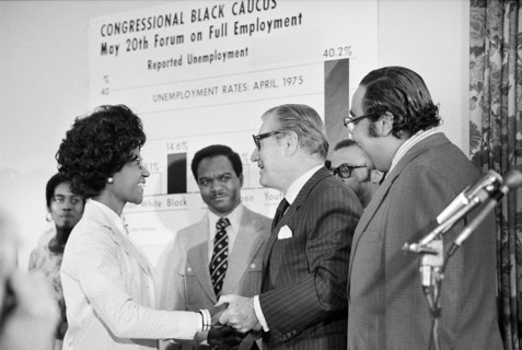 U.S. Vice President Nelson Rockefeller shaking hands with Shirley Chisholm, member of Congressional