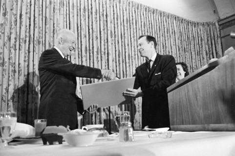 U.S. President Dwight D. Eisenhower shaking hands with member of Young Republicans at event,