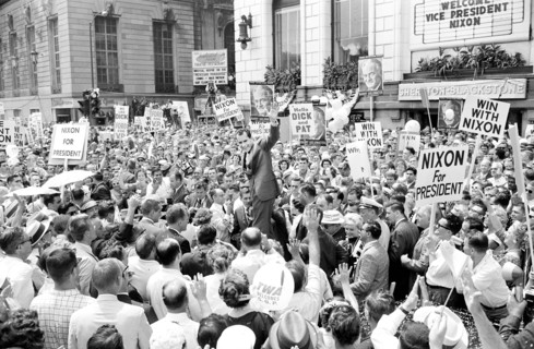 U.S. Vice President Richard M. Nixon and his family surrounded by crowds of supporters as they