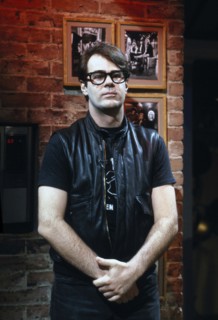 American actor Dan Aykroyd, half-length portrait, on-set of MTV Music Television, New York City,