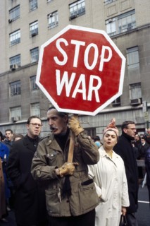 Man holding Stop War sign at anti-war rally, New York City, New York, USA, Bernard Gotfryd, 1969