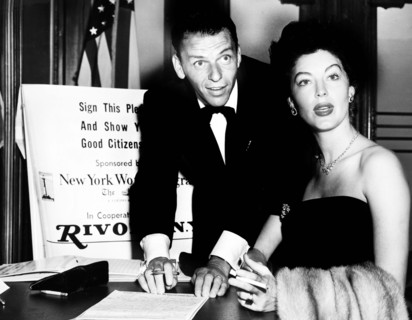 Frank Sinatra and Ava Gardner signing a pledge as good citizens, Herman Hiller, New York