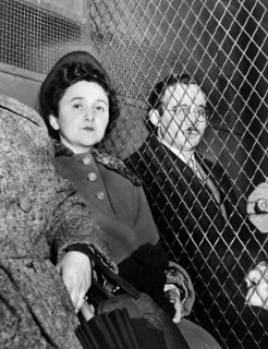 Ethel and Julius Rosenberg, separated by heavy wire screen as they leave U.S. Court House after