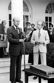 U.S. President Gerald Ford standing with Pierre Trudeau, Prime Minister of Canada, outside the