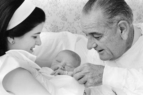 U.S. President Lyndon B. Johnson visiting daughter Luci Johnson Nugent and first grandchild,