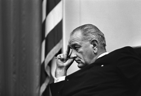 U.S. President Lyndon Johnson listening during cabinet meeting, Cabinet Room, White House,