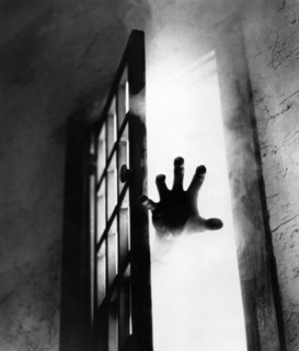 Hand emerging from mysterious mist, on-set of the film, "The Fog", AVCO Embassy Pictures, 1980