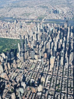 Aerial view of midtown Manhattan, Central Park and Upper East Side in foreground and Roosevelt