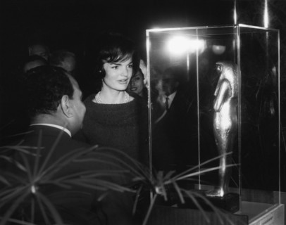 U.S. First Lady Jacqueline Kennedy viewing statuette Tutankhamun Exhibit with Egyptian