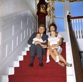 U.S. President John Kennedy and First Lady Jacqueline Kennedy sit with their children, John