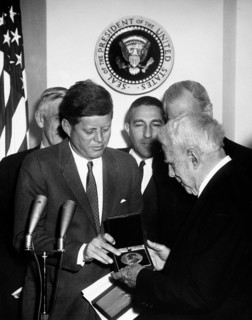 U.S. President John F. Kennedy presenting Congressional Gold Medal to American poet Robert Frost,