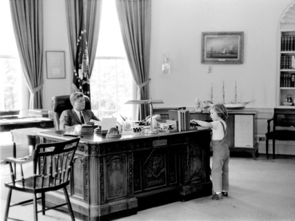 U.S. President John F. Kennedy and his daughter Caroline in Oval Office, White House, Washington, D