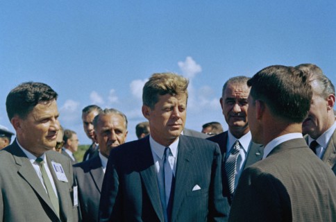 U.S. President John F. Kennedy visiting with astronaut Commander Walter M. Schirra (back to