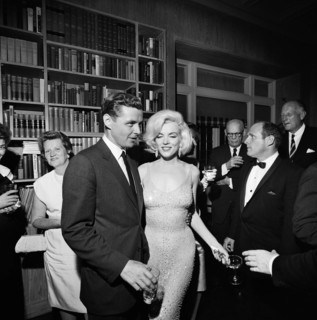 Steven E. Smith, brother-in-law of U.S. President John F. Kennedy, visiting with actress Marilyn