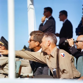 U.S. President John F. Kennedy (wearing sunglasses) and Commanding General J. Frederick Thorlin