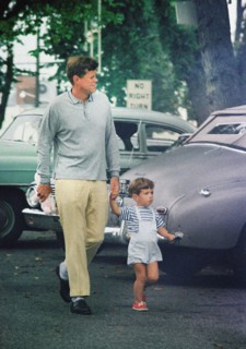 U.S. President John F. Kennedy and John F. Kennedy, Jr., departing toy store, Hyannis Port,