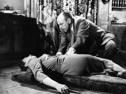 Joyce Gregg, George Coulouris, on-set of the British film, "The Woman Eater", aka "Womaneater",