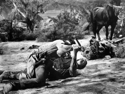 Rory Calhoun, on-set of the western film, "Apache Uprising", Paramount Pictures,