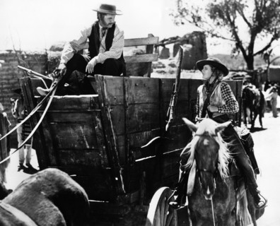 Regis Toomey, Jean Arthur, on-set of the western film, "Arizona", Columbia Pictures, 1940