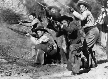 Alfonso Bedoya (standing left), Joe Dominguez (standing center), Frank Cody (kneeling left), Gordon