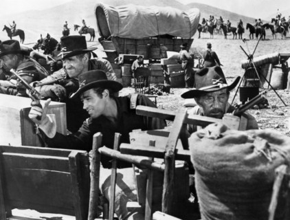 James Whitmore (foreground, left), Guy Madison (foreground, right), on-set of the western film,