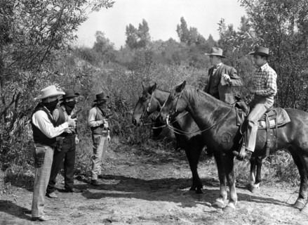 Bud Geary, Jack O'Shea, George Chesebro, Tom London, Jay Kirby, on-set of the western film,