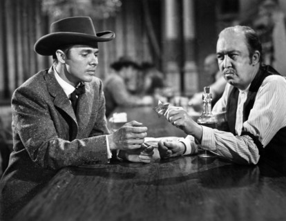 Audie Murphy, Ralph Peters, on-set of the western film, "Destry", Universal Pictures, 1954