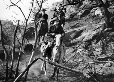 John Lund (foreground), on-set of the western film, "Five Guns West",  American Releasing