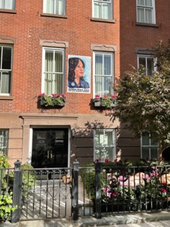 Harris Walz 2024 campaign poster on residential building, Greenwich Village, New York City, New