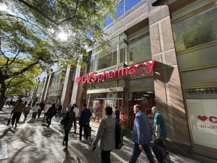 CVS Pharmacy and convenience store, building exterior and sidewalk scene, New York City, New York,
