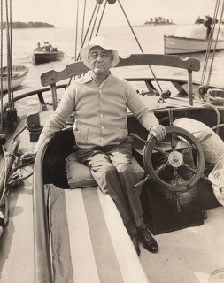 US. President Franklin D. Roosevelt at wheel of Amberjack II while sailing from Marion,