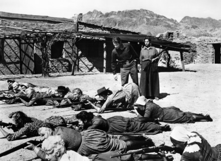 Audie Murphy, Hope Emerson (both standing rear), Peggy Maley (foreground), on-set of the western