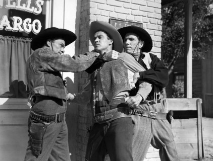 Kirby Grant (left), Fuzzy Knight (right), on-set of the western film, "Gun Town", Universal