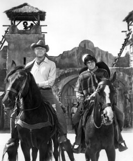 George Kennedy, Reni Santoni, on-set of the western film, "Guns Of The Magnificent Seven", United