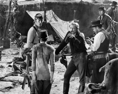 Charlton Heston, Richard Harris, on-set of the western film, "Major Dundee", Columbia Pictures,