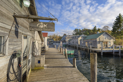 Carlson's fisheries and other dockside structures along Leland River, Leland, Michigan, USA