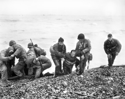 Surviving members of American landing party, whose landing craft was sunk by enemy action, reaching