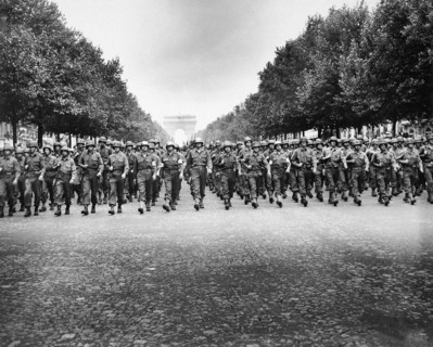 American troops of 28th Infantry Division march down Champs Elysees, in "Victory" parade, Paris,