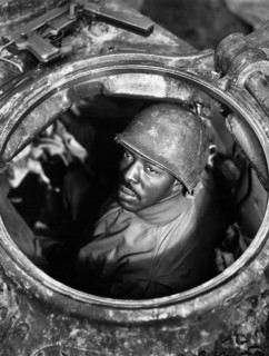 U.S. Corporal Carlton Chapman, machine-gunner in M-4 tank, attached to motor transport unit, near