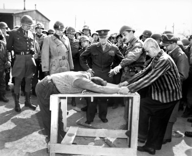 U.S. General Dwight D. Eisenhower, with U.S. Generals Omar Bradley and George Patton (at right)