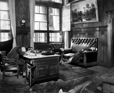 Burgomeister in his office with wife and daughter after they committed suicide as U.S. 69th