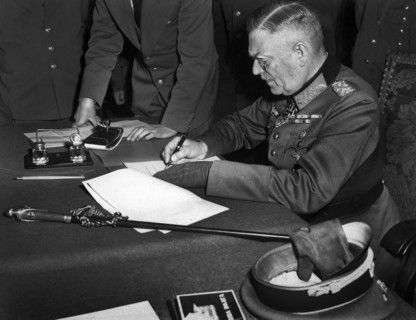 German Field Marshal Wilhelm Keitel, signing ratified surrender terms for the German Army at