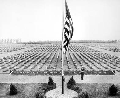 American bugler blowing taps at close of Memorial Day service at Margraten Cemetery, Holland, where