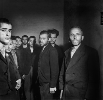 German Gestapo agents herded together in cell in the citadel after being arrested after the fall of